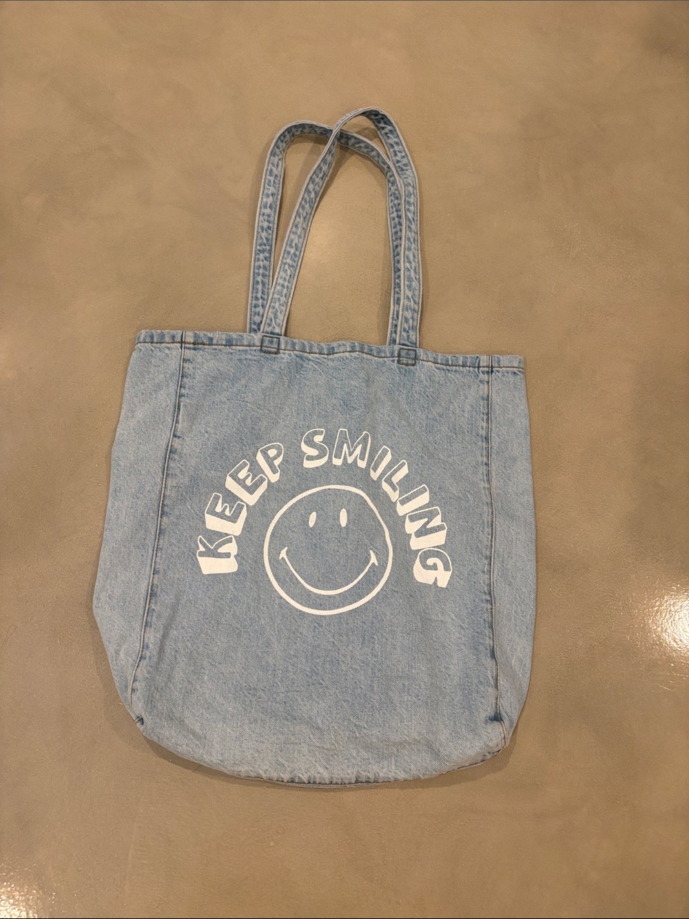 American Eagle Outfitters Light Blue Denim Tote with White Smiley Graphic